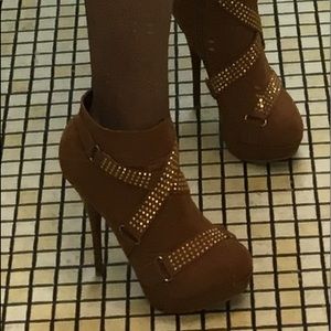 Brown and gold booties